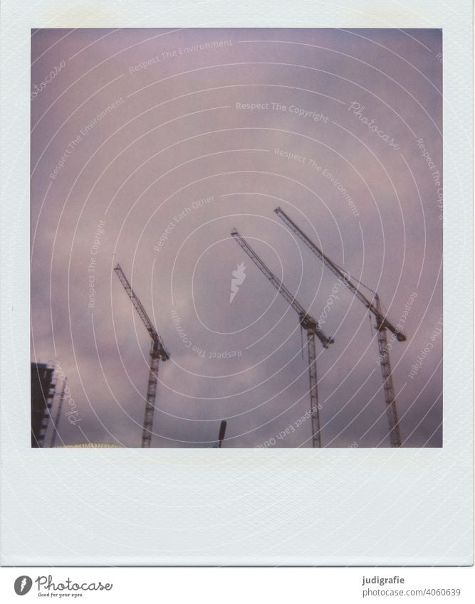 Three cranes on Polaroid Crane Construction site housing Sky Large Tall construction sector Build work Origin Steel technique Construction machinery Deserted