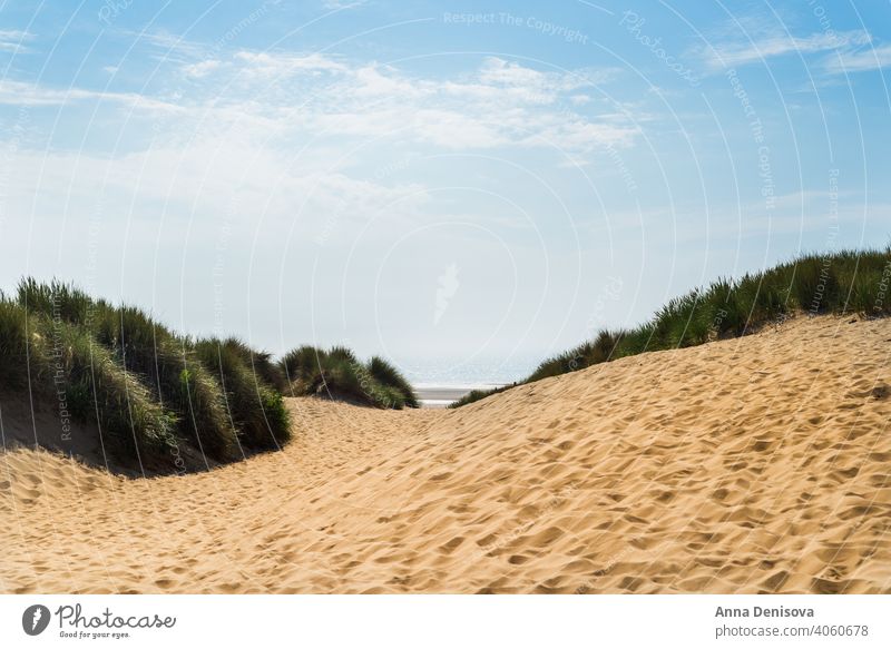 Sandy Formby Beach  near Liverpool on a sunny day formby beach liverpool UK england coast north west unusual hot Merseyside summer britain clear blue sky