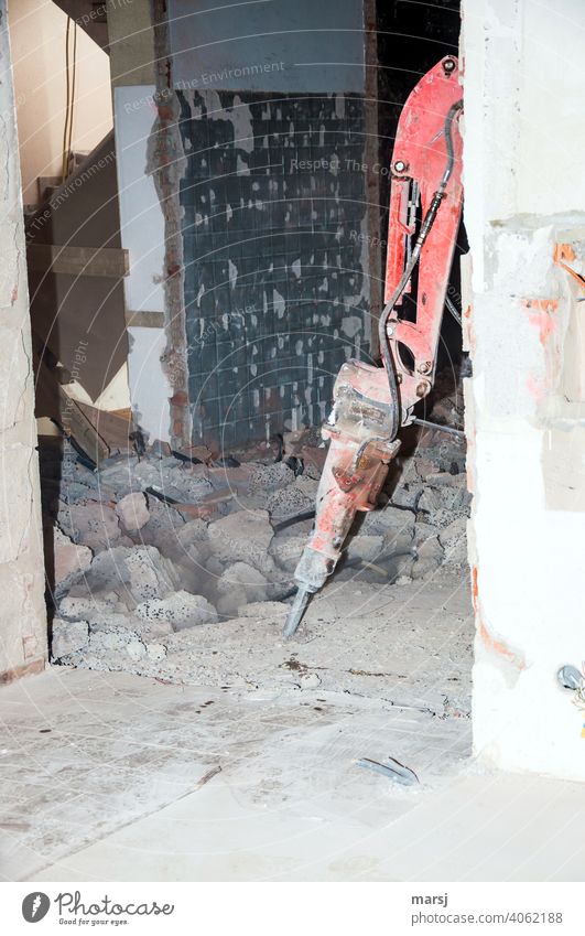 Who's knocking? Interior demolition hammer. Residential renovation Redevelop Housing refurbishment Demolition hammer Hydraulic breaker Modernization Workplace