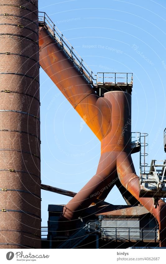 Steelworks, colliery, industrial monument Völklinger Hütte, blast furnaces, old rusty pipes at the blast furnace. Steel extraction Steel factory Mine