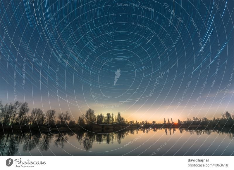 Star trails over the Silbersee near Speyer. star trail star trails stars north star pole star polaris earth rotating rotation ursae minoris landscape speyer