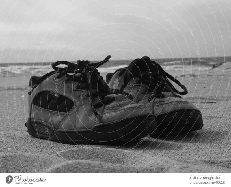 Shoes take a break Footwear Beach Ocean Vacation & Travel Leisure and hobbies Sand Black & white photo