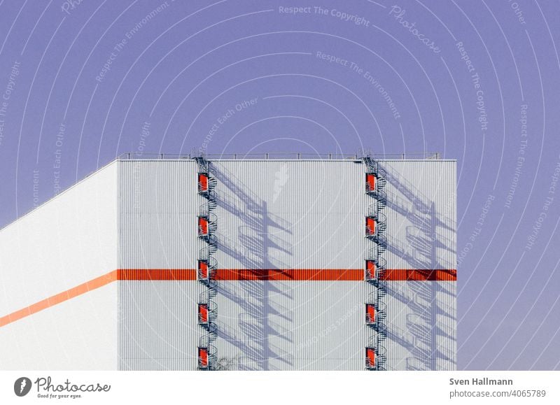 round fire escape casts large shadow Bremen DNA Shadow Stairs Pattern Facade Esthetic Modern Exterior shot Colour photo Symmetry Structures and shapes Deserted