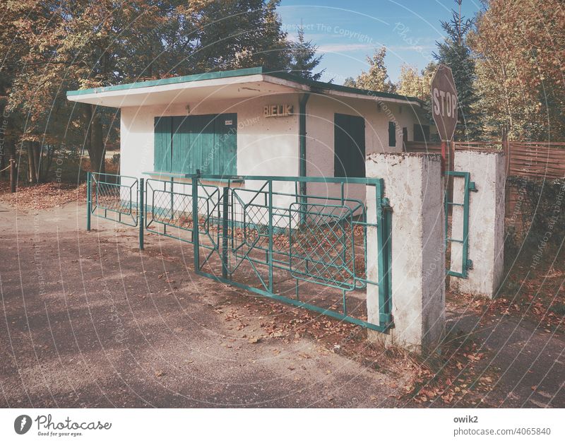 Old sump Building Shed Hut Tree Bushes Clouds Past Colour photo Subdued colour Remote Loneliness Deserted Exterior shot Copy Space top Copy Space bottom