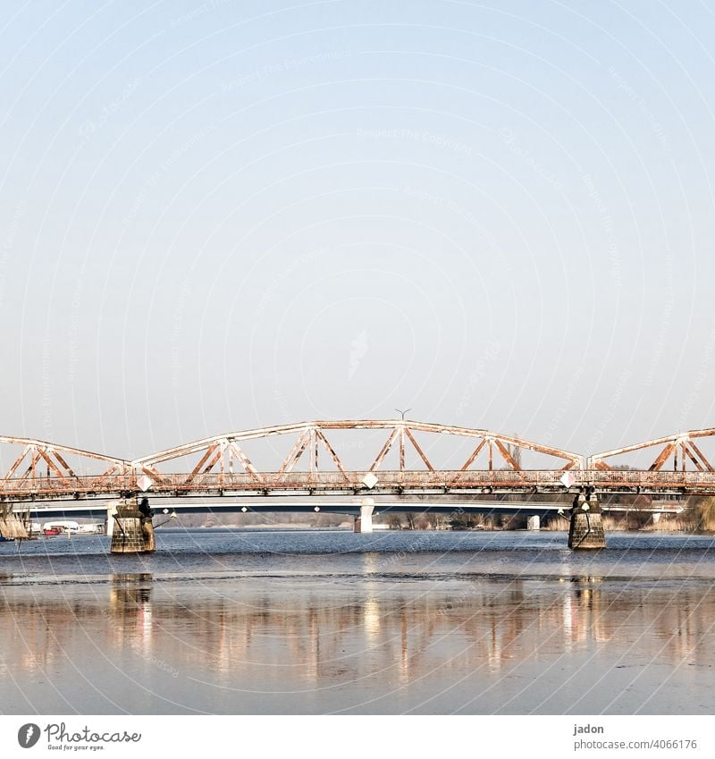 THE BRIDGE. Bridge Architecture Street Lanes & trails Manmade structures Deserted Steel Iron Reflection in the water piers Water Tourist Attraction River