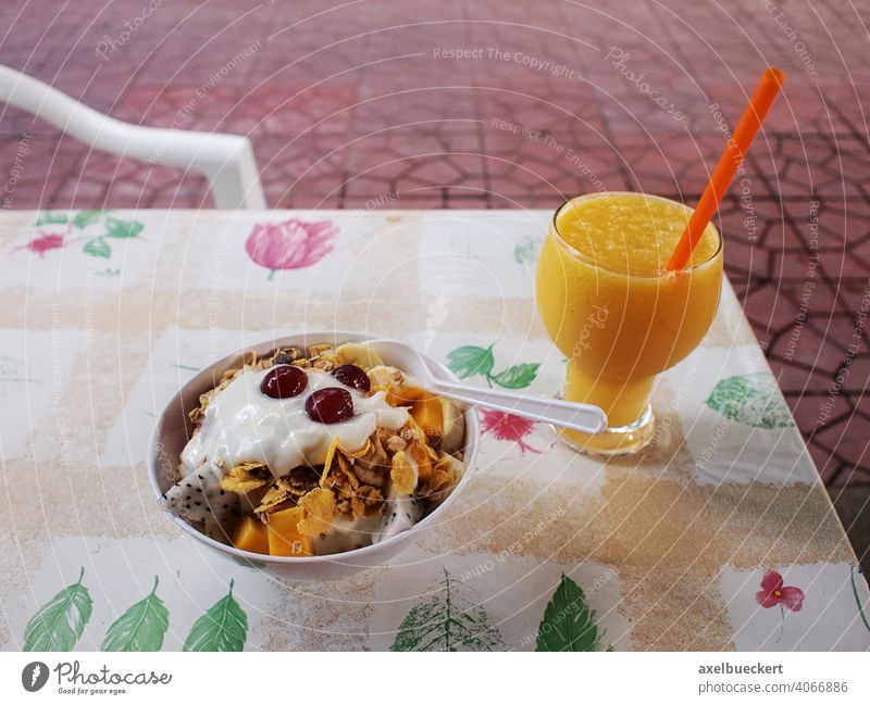 healthy breakfast with muesli fresh fruits and freshly squeezed orange juice Breakfast Healthy Eating Cereal Juice freshly-squeezed Orange juice Nutrition