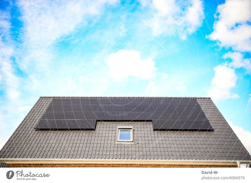 Solar system on a roof in good weather and sunshine Modern Beautiful weather Roof Renewable energy photovoltaics Sustainability Solar Power Solar Energy