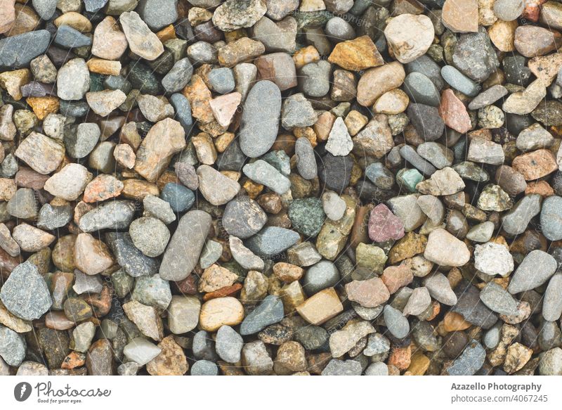 Wet stones on ta lakeshore abstract arrangement backdrop background basalt beach blue closeup color colorful dark decoration decorative design detail elements