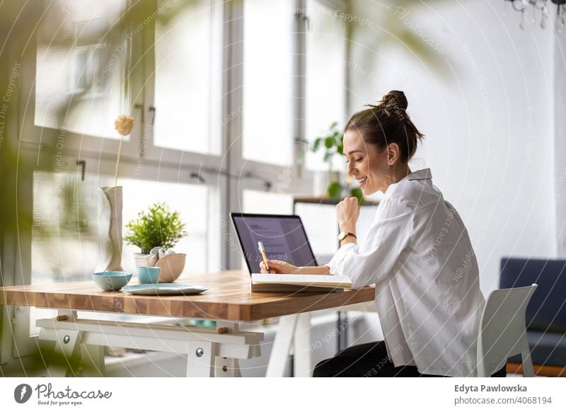 Young female freelancer working in loft office millennials student hipster indoors window natural girl adult one attractive successful people confident person