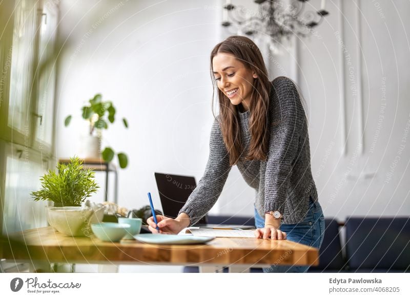 Young female freelancer working in loft office millennials student hipster indoors window natural girl adult one attractive successful people confident person