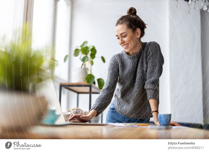 Young female freelancer working in loft office millennials student hipster indoors window natural girl adult one attractive successful people confident person