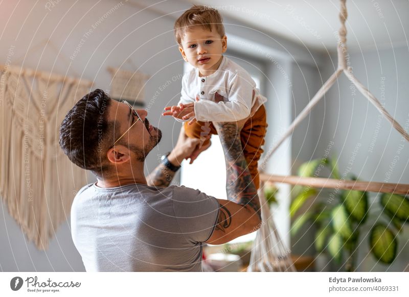 Father playing with his little son at home single parent single dad fathers day fatherhood stay at home dad paternity leave modern manhood family child house