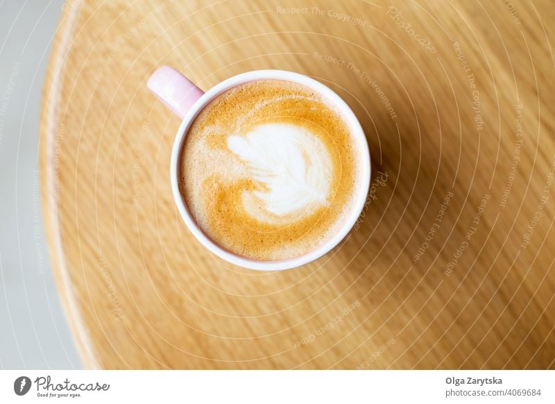 Cappuccino on wooden table. art latte cappuccino cup foam macchiato top view background design cream pattern vintage coffee breakfast brown cafe caffeine drink