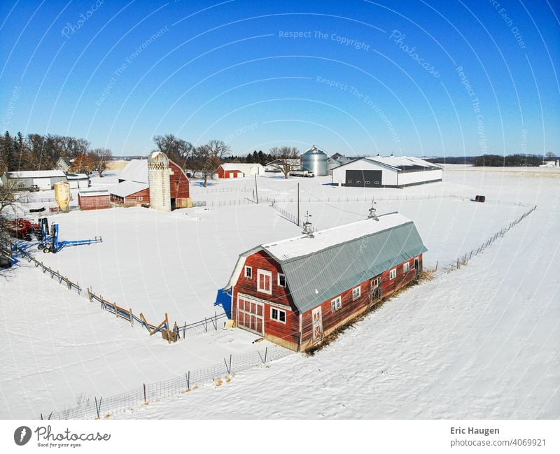 Quaint Rural Farm in Minnesota during Winter farmstead Barn barns Livestock Silo minnesota landscape farm landscape midwest Historic historical history Rustic