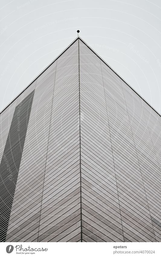 Abstract looking real buildings pointing like an arrow against an overcast sky Oberhafen abstract look Arrow background Black Blank Building Clean Close-up