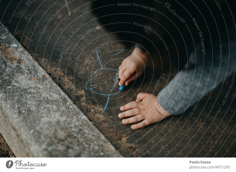 Child drawing with colored chalk on the floor Chalk Chalk drawing Close-up Draw Drawing Creativity Joy Street painting Asphalt Painting (action, artwork)