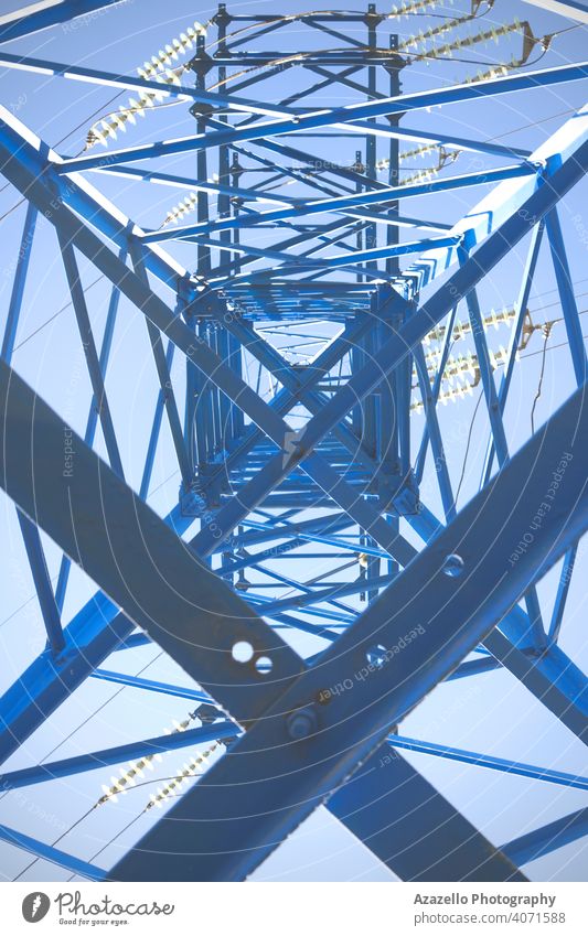 Eectricity pylon bottom view. inside blue business cable civilization current danger design distribution ecology electric electrical electricity energy