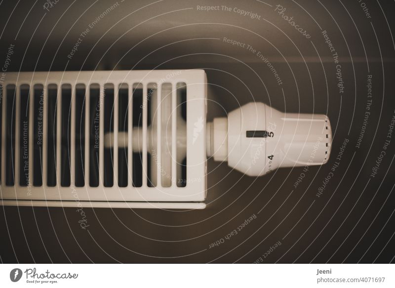 Thermostat on a radiator set to level 5 thermostat Thermostatic valve Heating Heater Temperature Valve Room room House (Residential Structure) Flat (apartment)