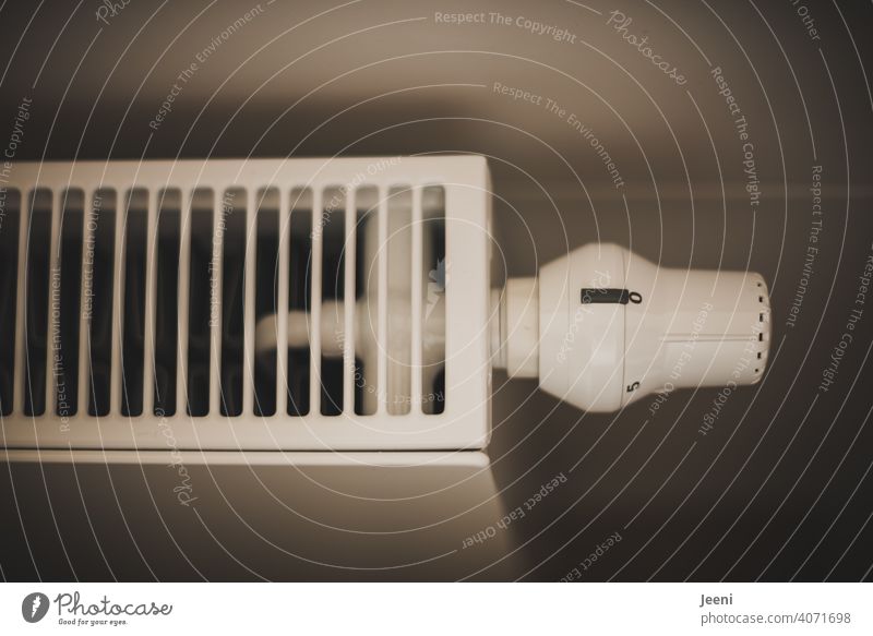 Thermostat on a radiator set to level 0 thermostat Heating Heater nil Temperature House (Residential Structure) Flat (apartment) Winter Cold Warmth