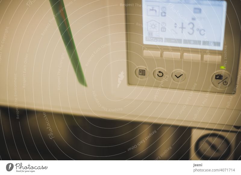 Heating controller or control unit of a heat pump | ecological, sustainable, modern and environmentally friendly heating system. Control unit Sustainability