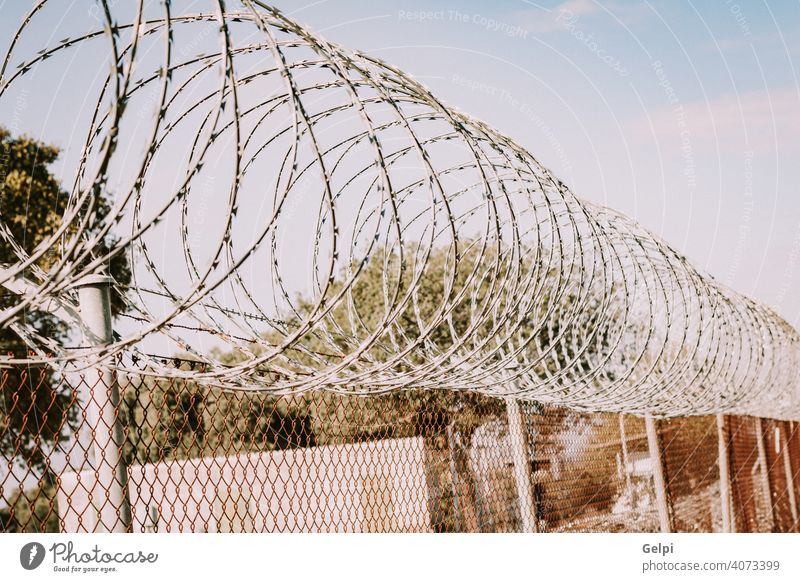 Safety fence of barbed wire metal jail iron protection razor steel sharp security danger barrier Concentration camps refugee camps barbwire refugees border