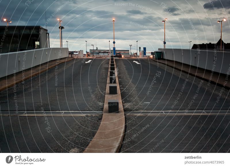 Car park access on the outside Building Sky Sky blue Deserted Copy Space housing Parking garage drive access road trace parking garage access Curve Parking lot