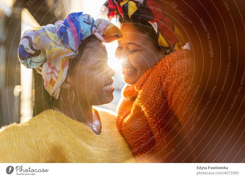 Beautiful happy girlfriends taking a selfie together diversity diverse people love outdoors day positivity confident carefree woman young adult casual beautiful