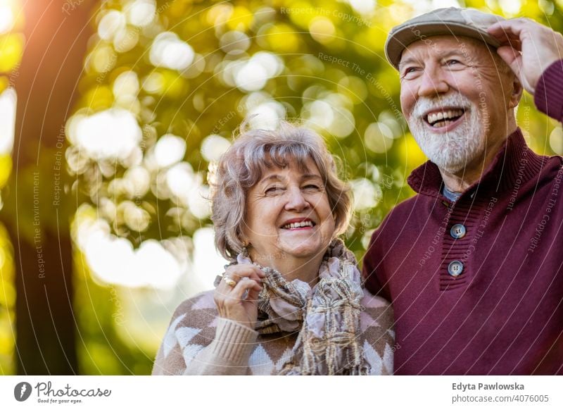 Senior couple enjoying autumn colors together senior love real people retired pensioner retirement aged grandmother grandparent grandfather day two togetherness