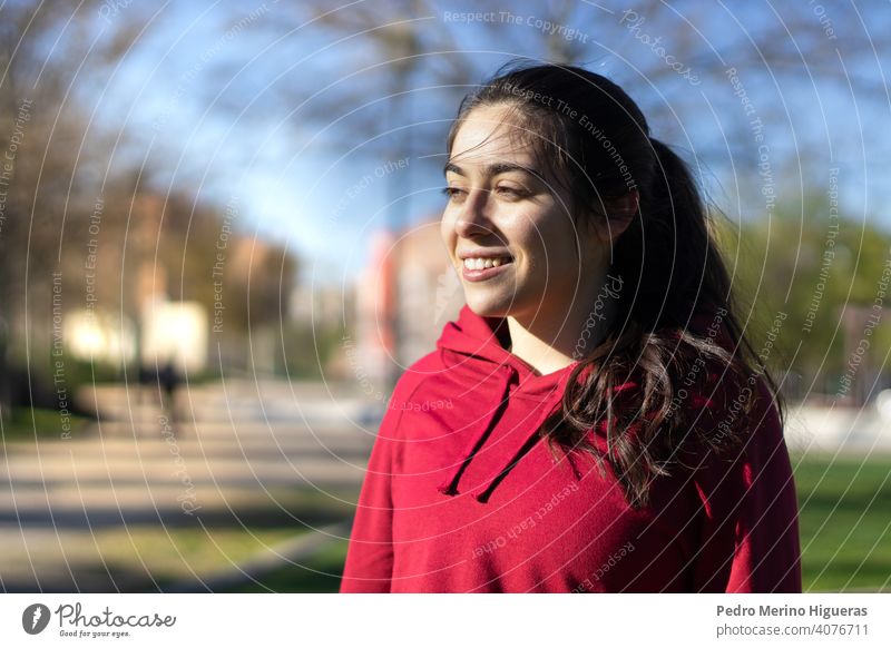 Young and sportive woman portrait in a park training fitness young female exercise workout healthy lifestyle athlete summer people sporty person activity