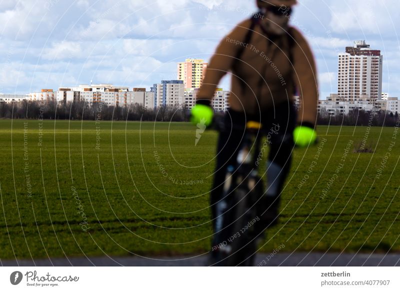 Marienfelde with cyclist Trip Berlin Block block construction Field Far-off places large housing estate City House (Residential Structure) Horizon Agriculture