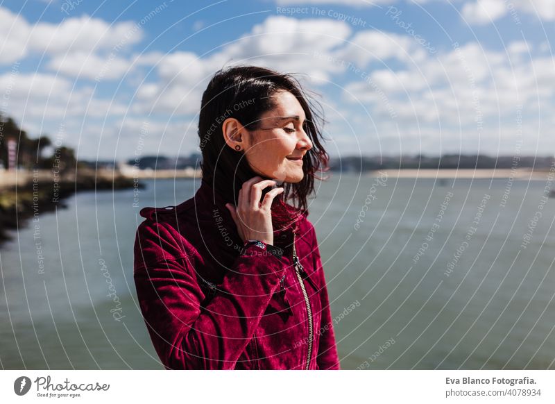 young caucasian backpacker woman sightseeing Porto views by the river. Travel and friendship concept sun travel spring city urban beautiful people tour tourism