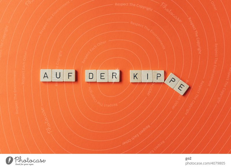 On the edge on the tip Letters (alphabet) Scrabble Figure of speech Characters Typography Insecure insecurity Tumble down Decide Text To fall Adversity unlucky