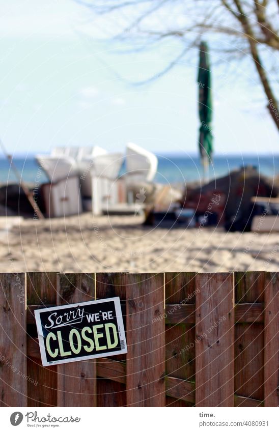 thoughts on corona swords | again someone has given up Beach chair Closed sunny Fence closed Sand Sky Sunshade Gloomy pandemic untidy forsake sb./sth. sad