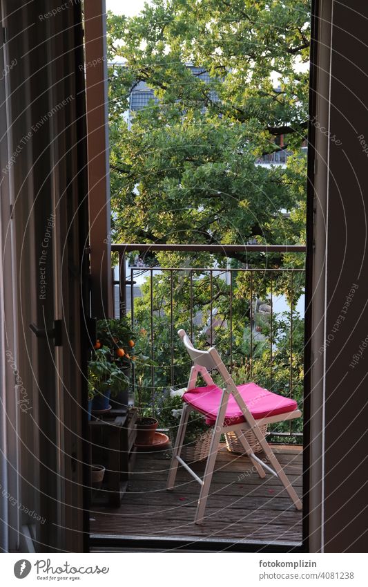 Chair with pink cushions on a balcony and large tree in the background Balcony Cushion Idyll Relaxation Calm Summer Personal Tree Folding chair Flat (apartment)