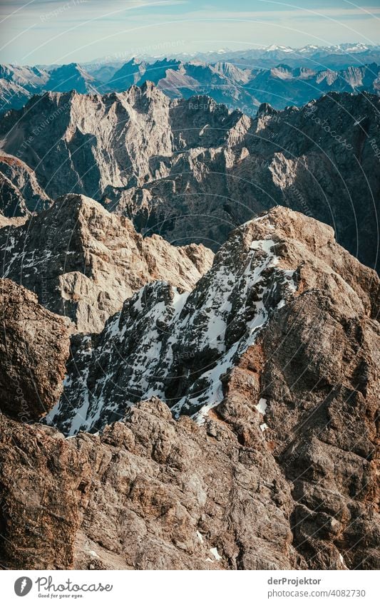 Panoramic view from the Zugspitze V Snowscape Structures and shapes Austria Environmental balance Polluter Destruction Glacier Snowcapped peak Rock Mountain Ice