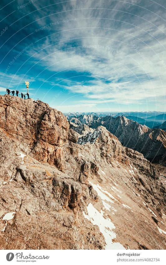 Zugspitze with summit cross and climbers Snowscape Structures and shapes Austria Environmental balance Polluter Destruction Glacier Snowcapped peak Rock