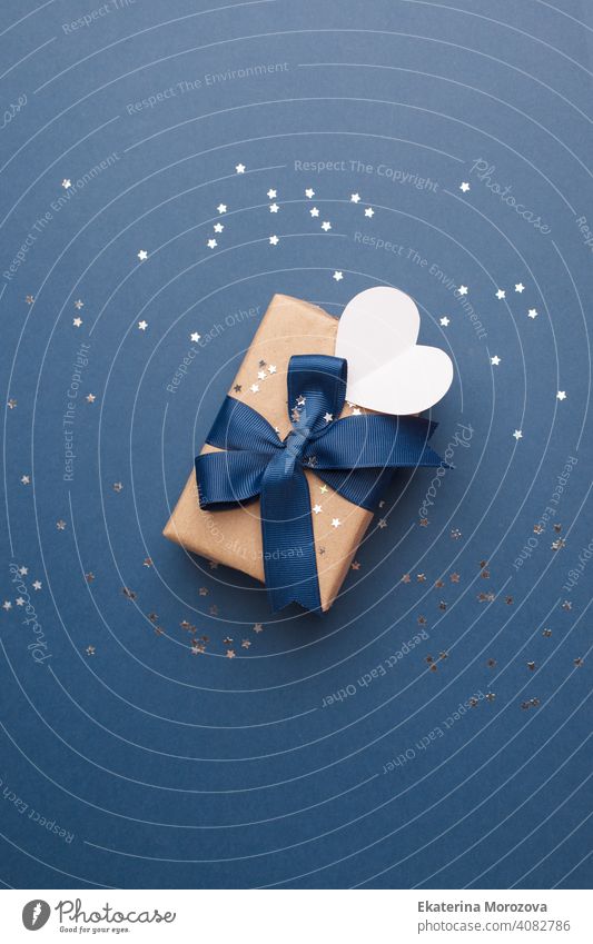 Blue theme craft gift box present gift with classic blue ribbon and white heart shape tag for Happy Fathers Day message, holiday, xmas, christmas 2021 banner, flyer, coupon