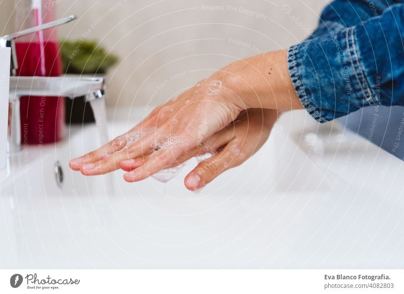 unrecognizable woman washing hands on a sink with soap. Coronavirus covid-19 concept corona virus stay home alcohol hygiene personal sanitary life water female