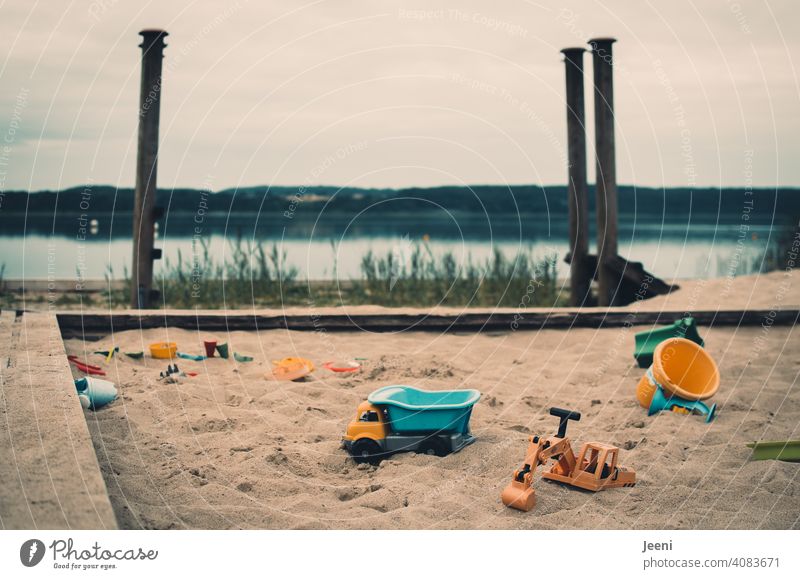 Soon it will be summer again | Sandbox for children on a playground at the lake sandbox Playground Bucket Lake Bathing place Summer Toys Infancy