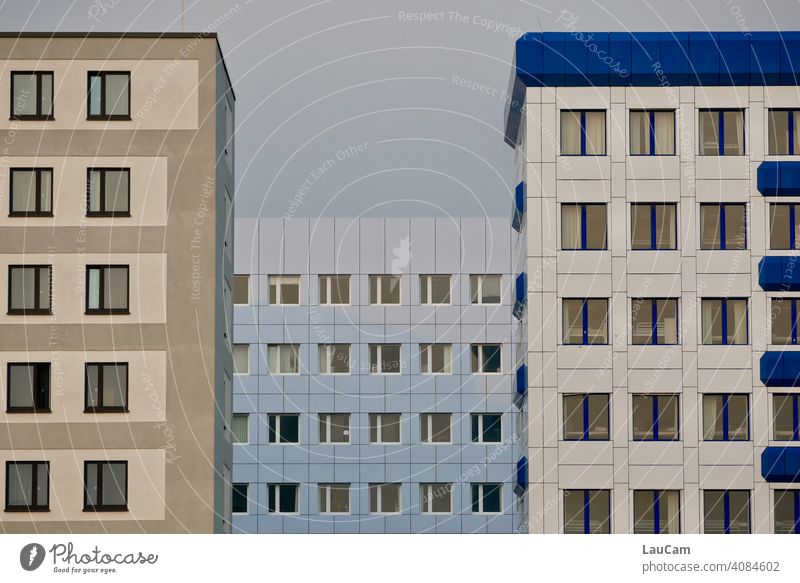 Window front of three high-rise buildings in the colours white, blue, light blue, beige and brown High-rise skyscrapers Facade Glazed facade White Blue Sky blue