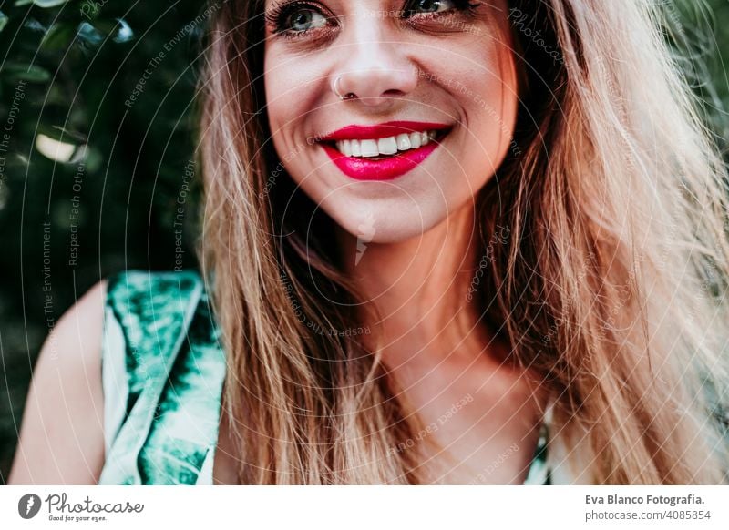 portrait of beautiful blonde young woman smiling at sunset. Red lips and gorgeous smile. Happiness concept caucasian hair toothy cute happy girl pretty health