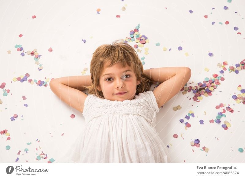 Close up indoors portrait. Beautiful kid smiling, fun and lifestyle.white background child cute lifestyle happiness cheerful beautiful little hair face girl