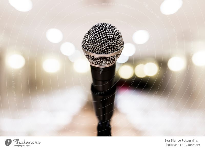 Close up old microphone in conference room. Business and company concept dirty audio blur rusty press presentation mesh lecture entertainment speech live