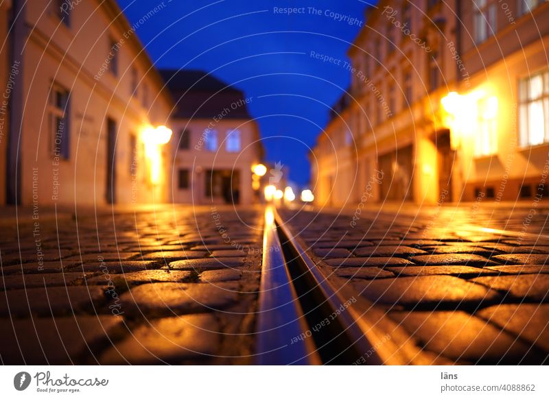 Blue hour in Brandenburg Lanes & trails Street Night Deserted Long exposure Light Traffic infrastructure Town Street lighting tram tracks