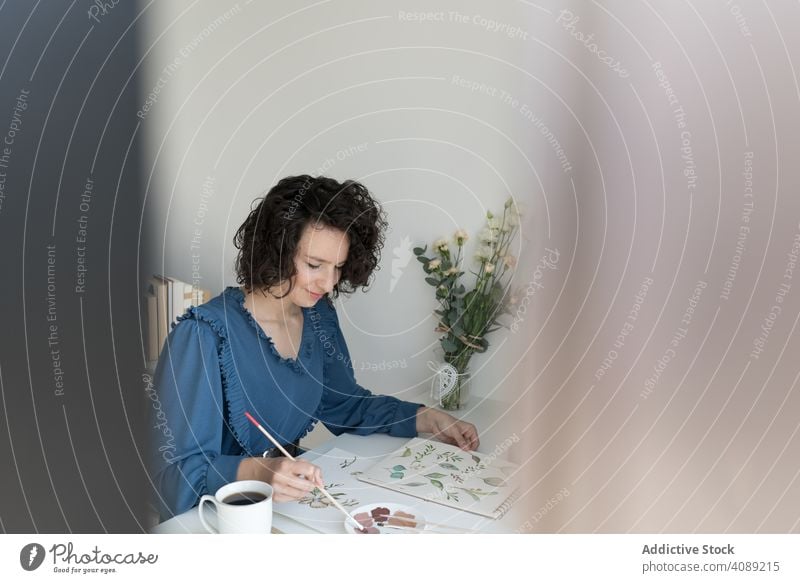 Woman painter working at home woman drawing picture flower hand art artist workplace creativity design craft leisure artwork professional inspiration talent