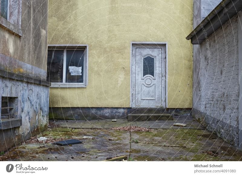 Courtyard of an abandoned house Interior courtyard Architecture House (Residential Structure) Building Dirty Derelict Old Gloomy Yellow Deserted Facade