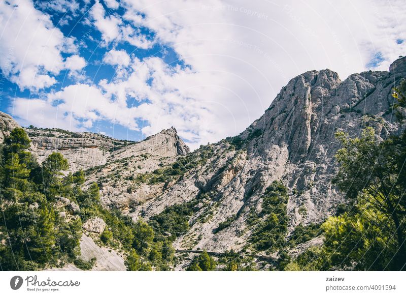 calm stream with many stones on the path eroded layered canyon nature outdoors travel destinations mountain spain tarragona descent moment moody sad stormy