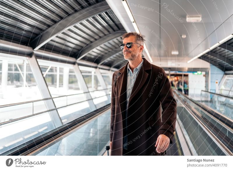 Caucasian business man at airport person lifestyle people middle aged handsome senior caucasian city adult male portrait casual urban confident fashion