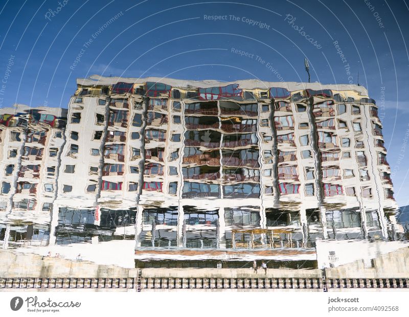 nebulous house on the quiet river Facade Surface of water Reflection hazy sunshine blurriness Downtown Berlin Cloudless sky Architecture Calm River Spree