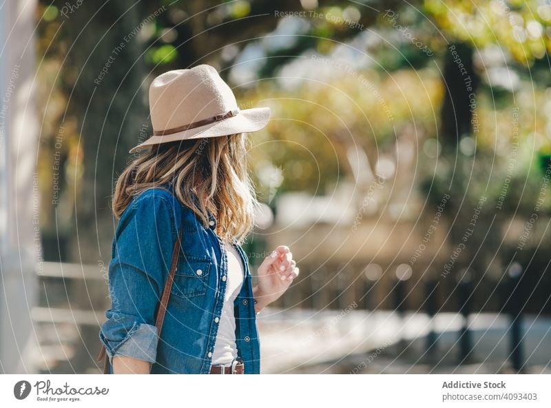 Tourist woman walking on the street smile cheerful happy friendly lifestyle model casual relaxation leisure rest attractive disposable autumn enjoyment beauty